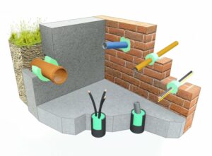 Passage de câbles à travers un mur traité avec un mastic hydro-expansif pour stopper les infiltrations d’eau, même sous une forte pression hydrostatique.